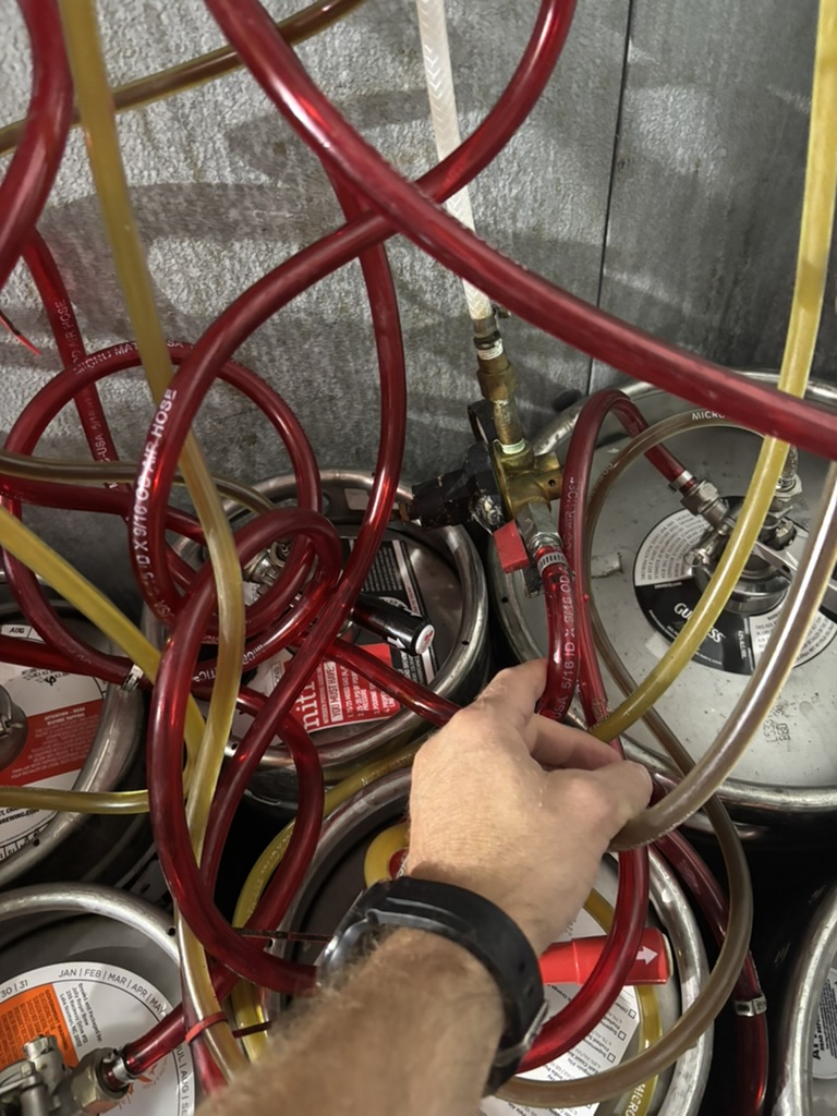 Product lines being traced inside a working walk-in cooler