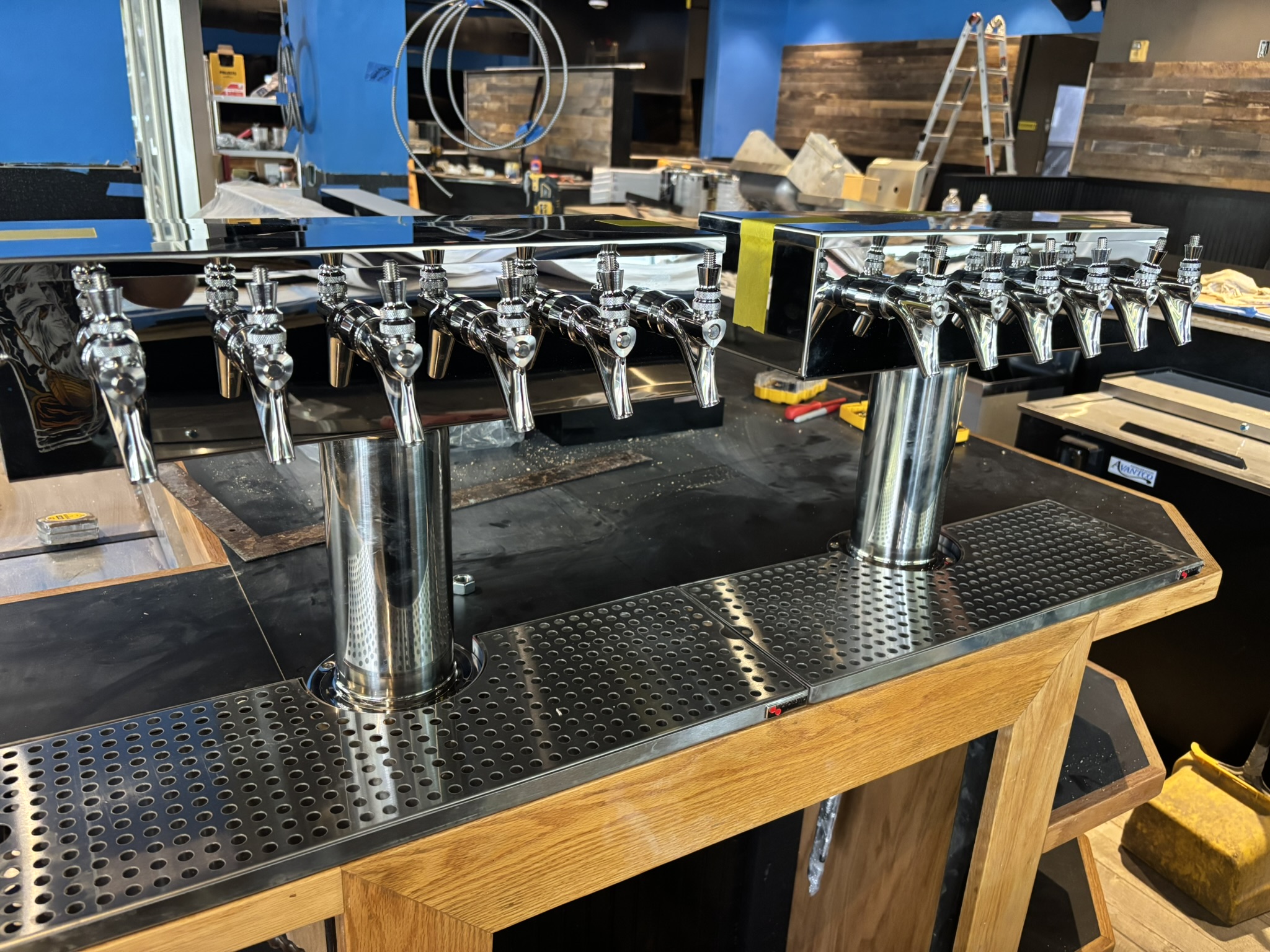 Twin chrome draft towers installed at a commercial bar